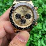 Rolex Daytona Exclusive Replica Watch Black Strap Gold Dial
