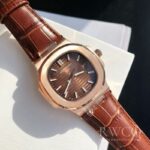 Patek Philippe Nautilus Eye Catching Replica Watch Brown Strap White Dial