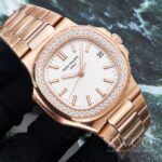 Patek Philippe Nautilus Luxurious Replica Watch Black Strap Gold Dial - immagine 2