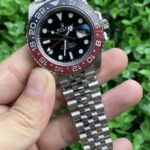 Rolex GMT Master Pepsi Eye Catching Replica Watch Silver Strap Black Dial